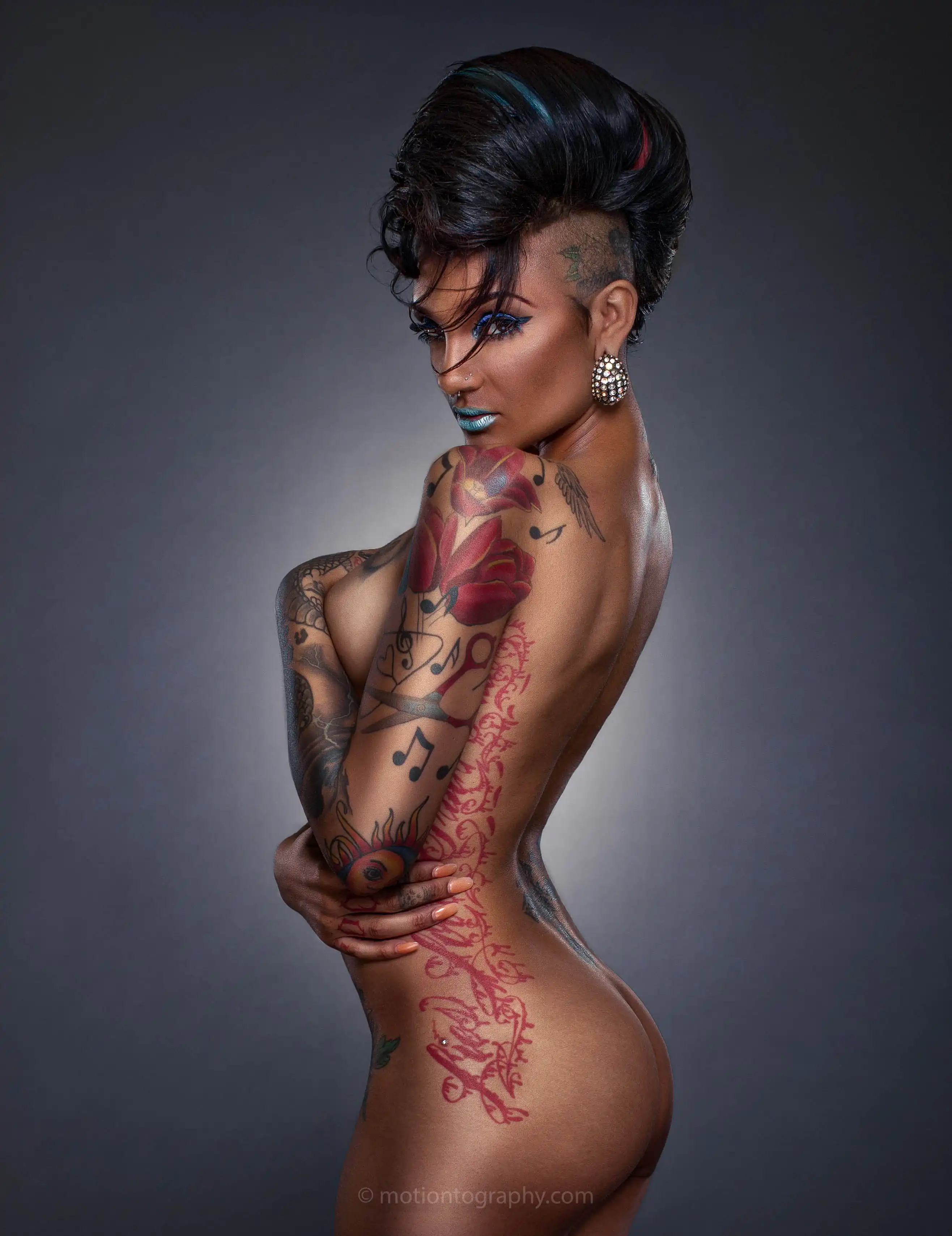 Edgy boudoir photo featuring mohawk hairstyle