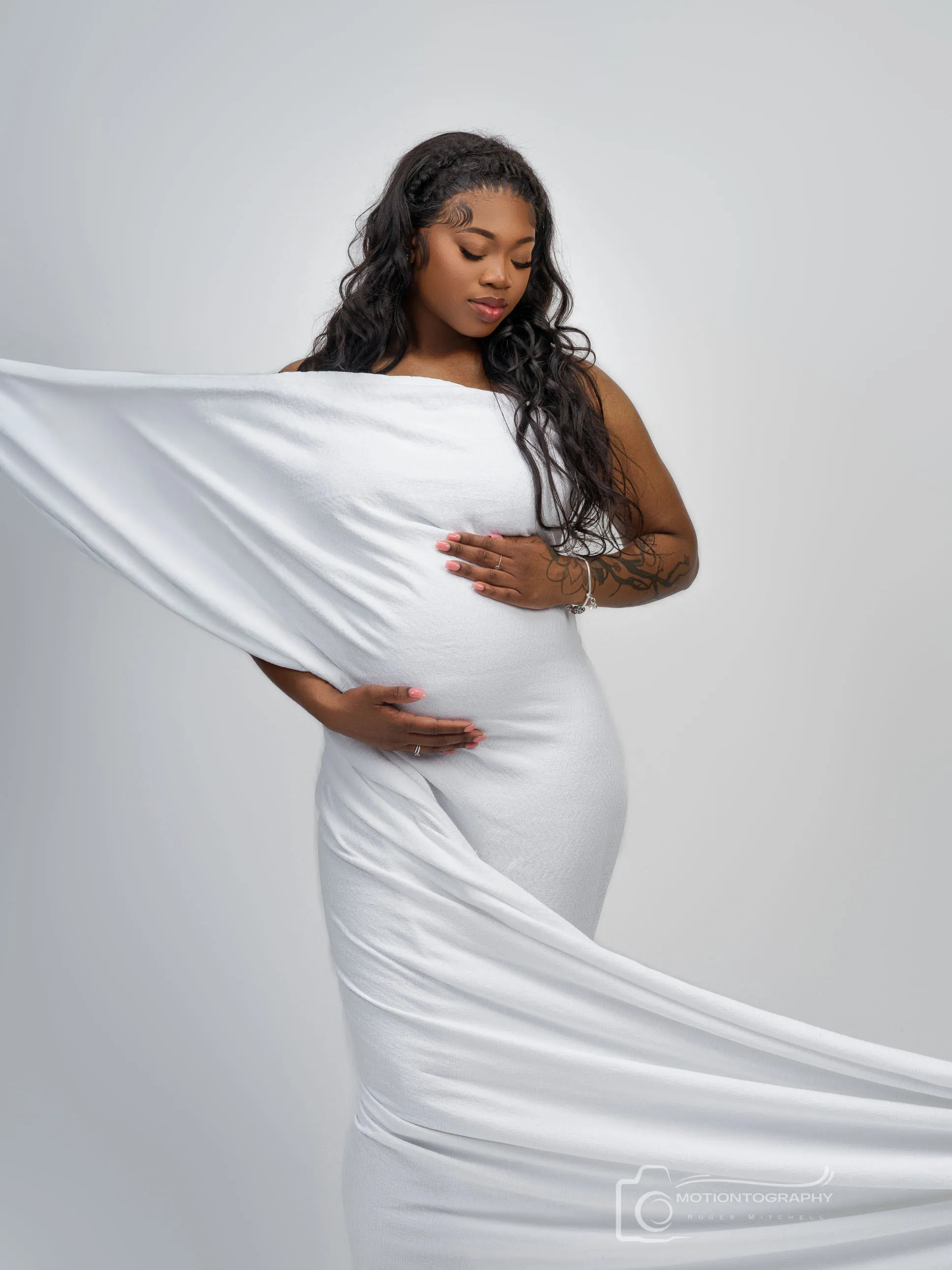 Classic maternity portrait elegant white dress timeless photography