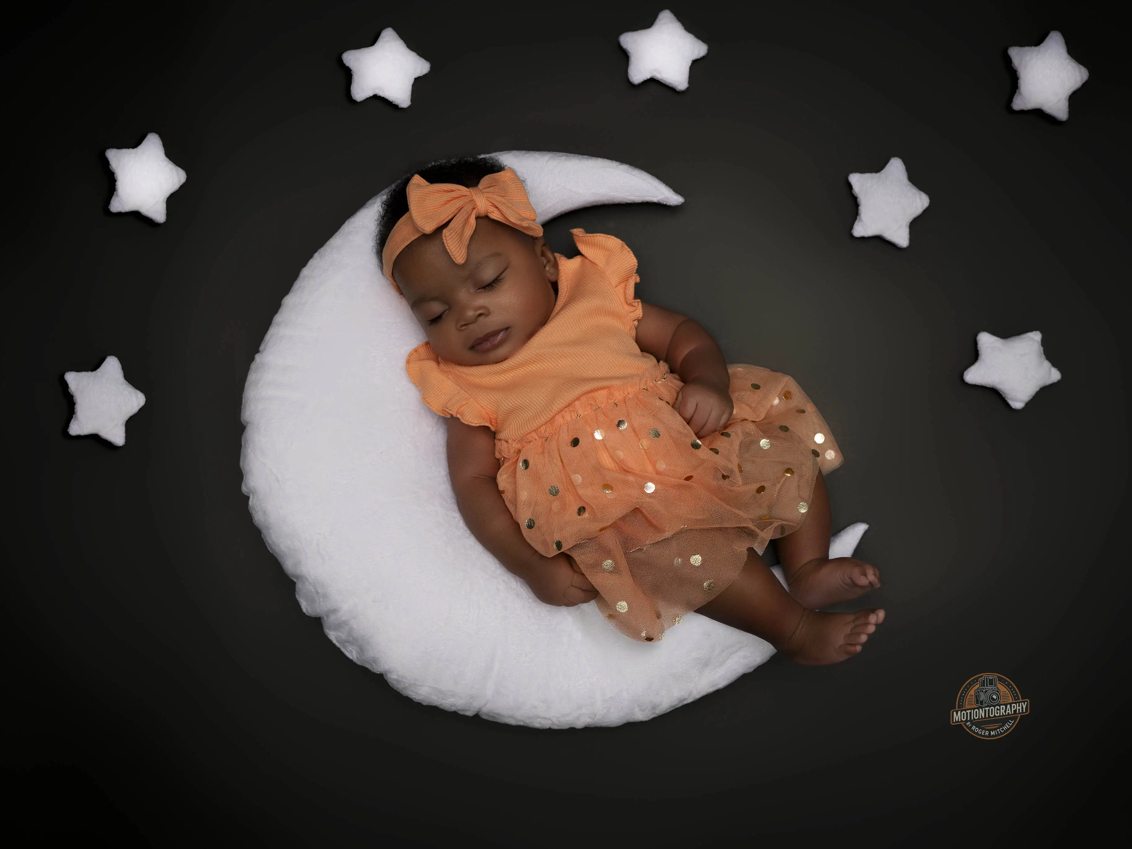 Newborn baby sleeping on moon prop, Suffolk VA newborn photographer