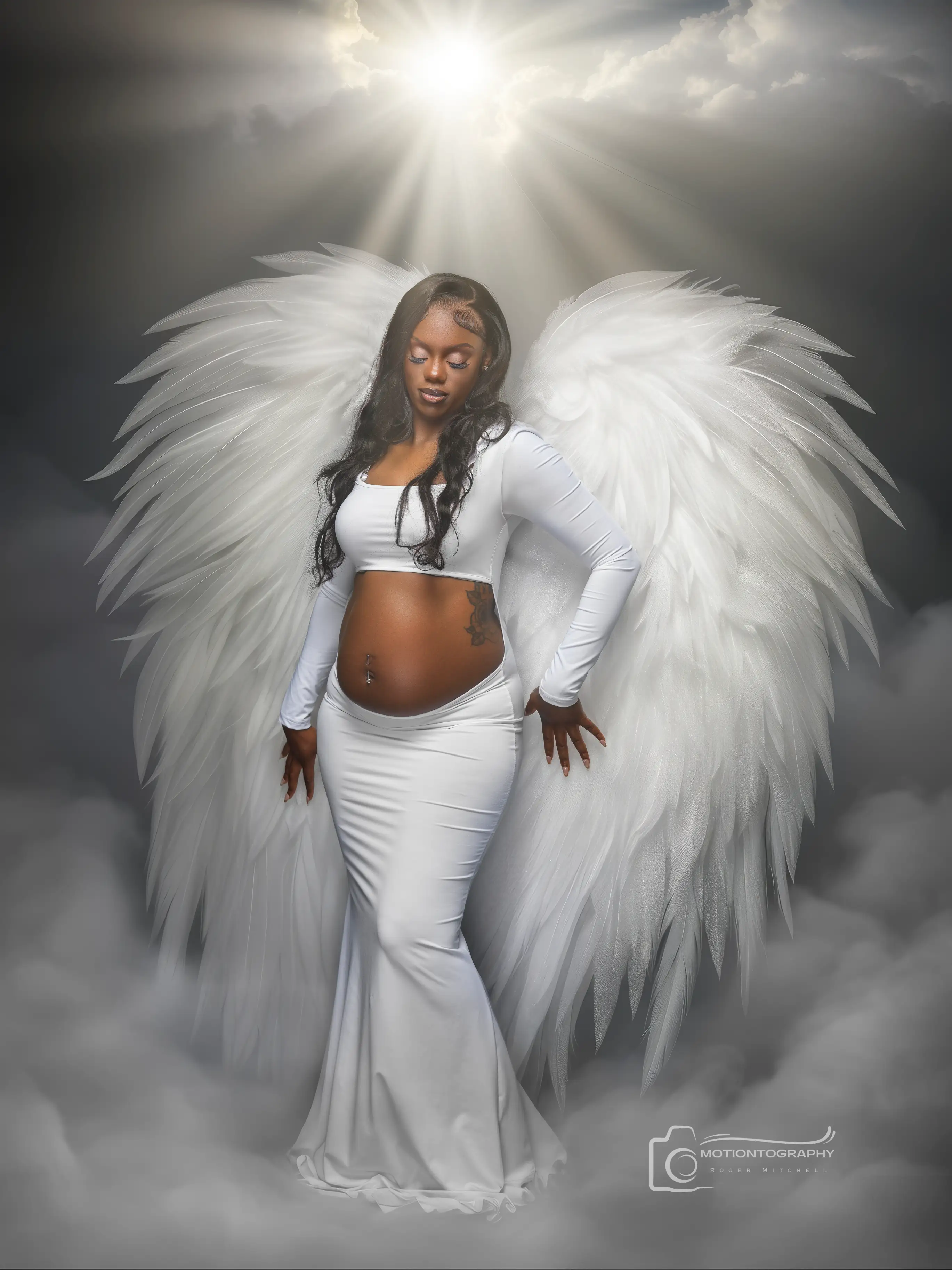 Angelic wings fine-art maternity portrait